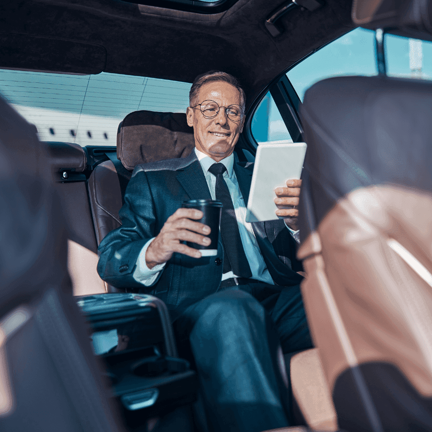 "GB Limo luxury vehicle parked, ready for a seamless and comfortable airport transfer with professional chauffeur service."