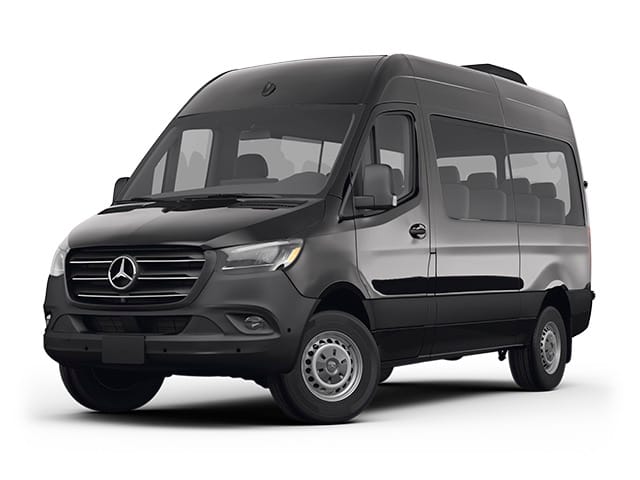 "Spacious luxury van with leather seating, Wi-Fi, and climate control, offering a comfortable and roomy ride for larger groups or families."